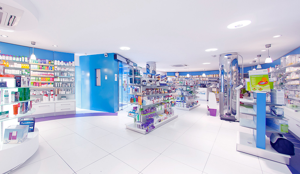 Diseño de tienda punto de venta al publico espacio y sectores proyecto de arquitectura corporativa para cadena de farmacias